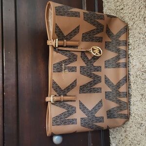 Brown open top Michael Kors purse